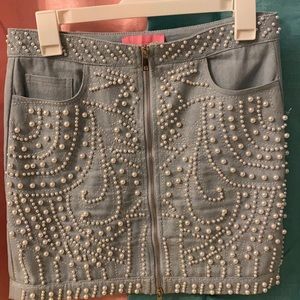 Skirt set. Includes jacket and skirt.